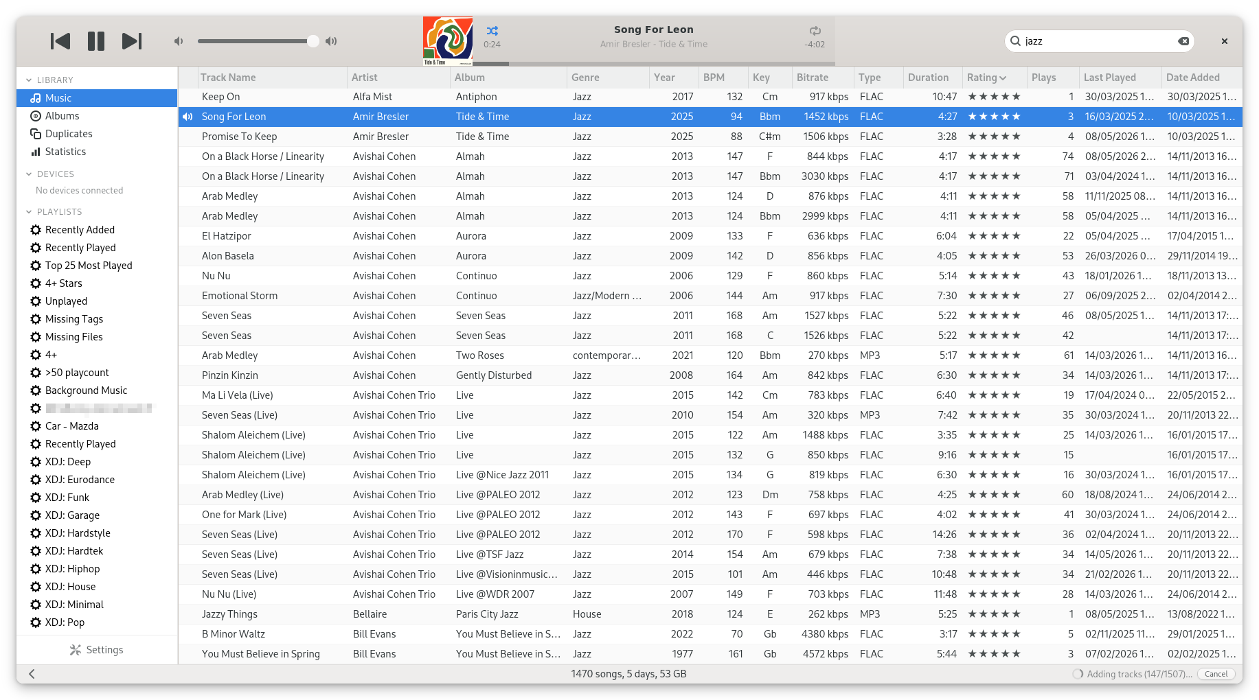 Sustain's Songs view: a dense, sortable track table with star ratings, BPM, key and play counts.